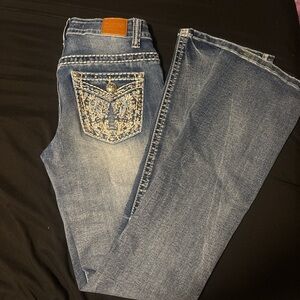 Elegant Boot Cut Jeans with Embroidered Pocket
